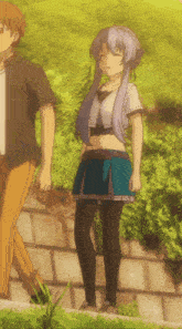 a man and a girl are standing next to each other in a park