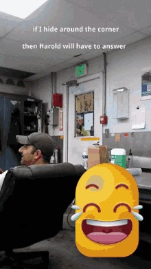 a man sits in a chair with a smiley face in front of him with tears coming out of his eyes