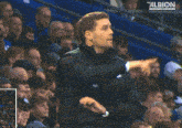 a man with the word albion on his jacket