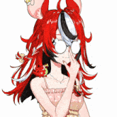 a girl with red hair and glasses covering her eyes