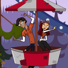 a man and a woman are sitting in a ferris wheel