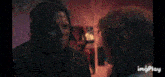 a man with a dirty face is standing next to a woman and says " gags "