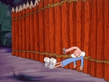a cartoon character is peeking over a red wooden fence