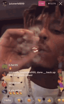 a screenshot of juice wrld smoking a cigarette
