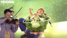 a man playing a violin next to a bowl of salad with the word original on the bottom