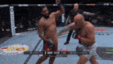 two men are fighting in a ufc heavyweight bout with cortes acosta in the lead