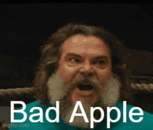 a man with a beard is screaming with the words bad apple written below him