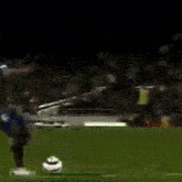 a blurred image of a soccer player with the number 8 on his jersey