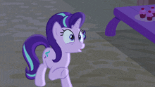 a cartoon of a purple pony with a blue star on her chest