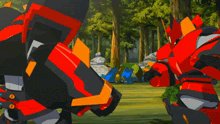 two transformers are standing in a field and one has the number 0 on its chest