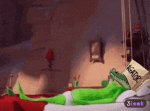 a cartoon of a crocodile laying on a bed with a box that says gator on it