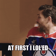 a man in a hockey jersey says at first i lol ed
