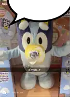 a stuffed animal with a speech bubble says alex