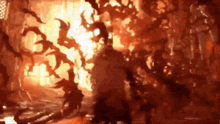 a blurry picture of a fire with a lot of smoke coming out of it