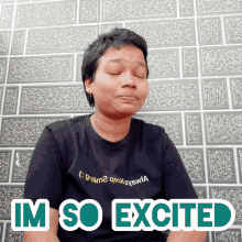 a man with his eyes closed and a shirt that says im so excited on it