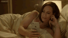 Checking Phone In Bed GIF - Miriam Shor Diana Trout Iphone GIFs