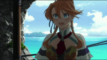 a girl with red hair and blue eyes is standing in front of the ocean