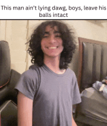 a young man with curly hair is smiling in a bedroom with a caption that says this man ain 't lying dawg
