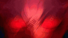 a close up of a person 's face with glowing red eyes .