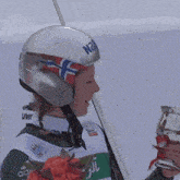 a skier wearing a helmet that says n2 on it