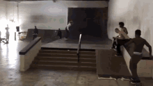 a group of skateboarders are doing tricks on a ramp at a skate park