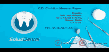 a blue sign for salud dental with a tooth and dental tools
