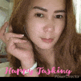 a woman 's face is shown with the words happy tasking below it