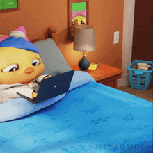 a cartoon character is laying on a bed with a laptop
