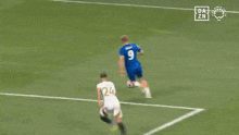 a soccer game is being played in front of a hisense ad