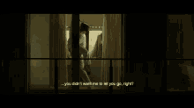 a person standing in front of a window with the words " tell me i love you "