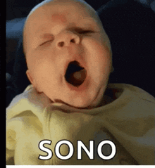 a baby is yawning with the word sono on the bottom right