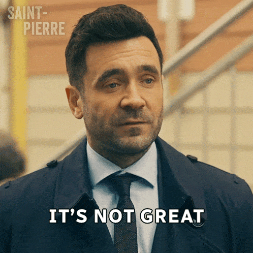 a man in a suit and tie is saying 