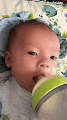 sam sam cute baby drinking milk