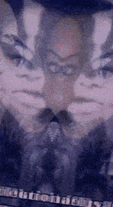 a blurred image of a woman 's face with the words ' life ' on the bottom right