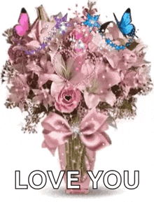 a bouquet of pink flowers in a vase with butterflies flying around it .