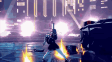 a girl is holding a gun in front of a sign that says ' aoun ' on it