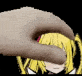 a hand is touching a girl 's face with a black background .