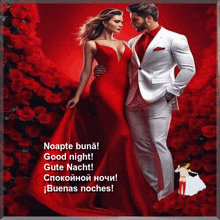 a man in a white suit and a woman in a red dress standing next to each other