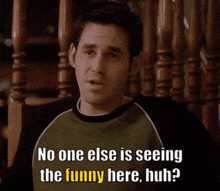 a man in a green shirt says no one else is seeing the funny here huh ?