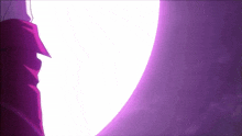 a person in a red jacket is standing in front of a purple and white light .