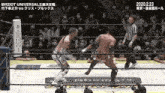 two wrestlers are fighting in a ring with a referee watching .