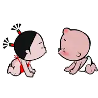 a boy and a girl are kissing in front of a heart .