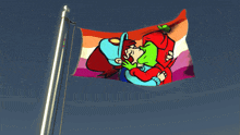 a rainbow flag with a cartoon of two people kissing on it
