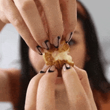 Look At This Snack Tina Yong GIF - Look At This Snack Tina Yong Splitting The Bread GIFs