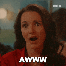 a woman with a surprised look on her face and the word awww in white letters