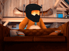 a teddy bear wearing a helmet and goggles is sitting on a couch