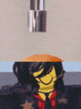 a close up of a lego man 's face with a smiley face on it