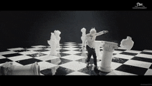 a black and white image of a chess board with sm entertainment written on the bottom right