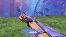 a gold colored rifle is in a video game