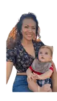 a woman is holding a baby who is wearing a bib that says i love you